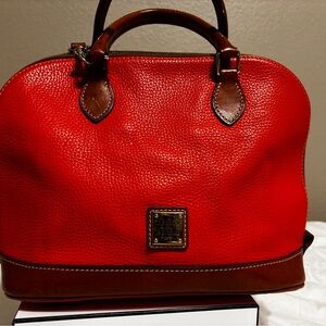 Dooney & Burke Pebble Grain Satchel in tangerine.